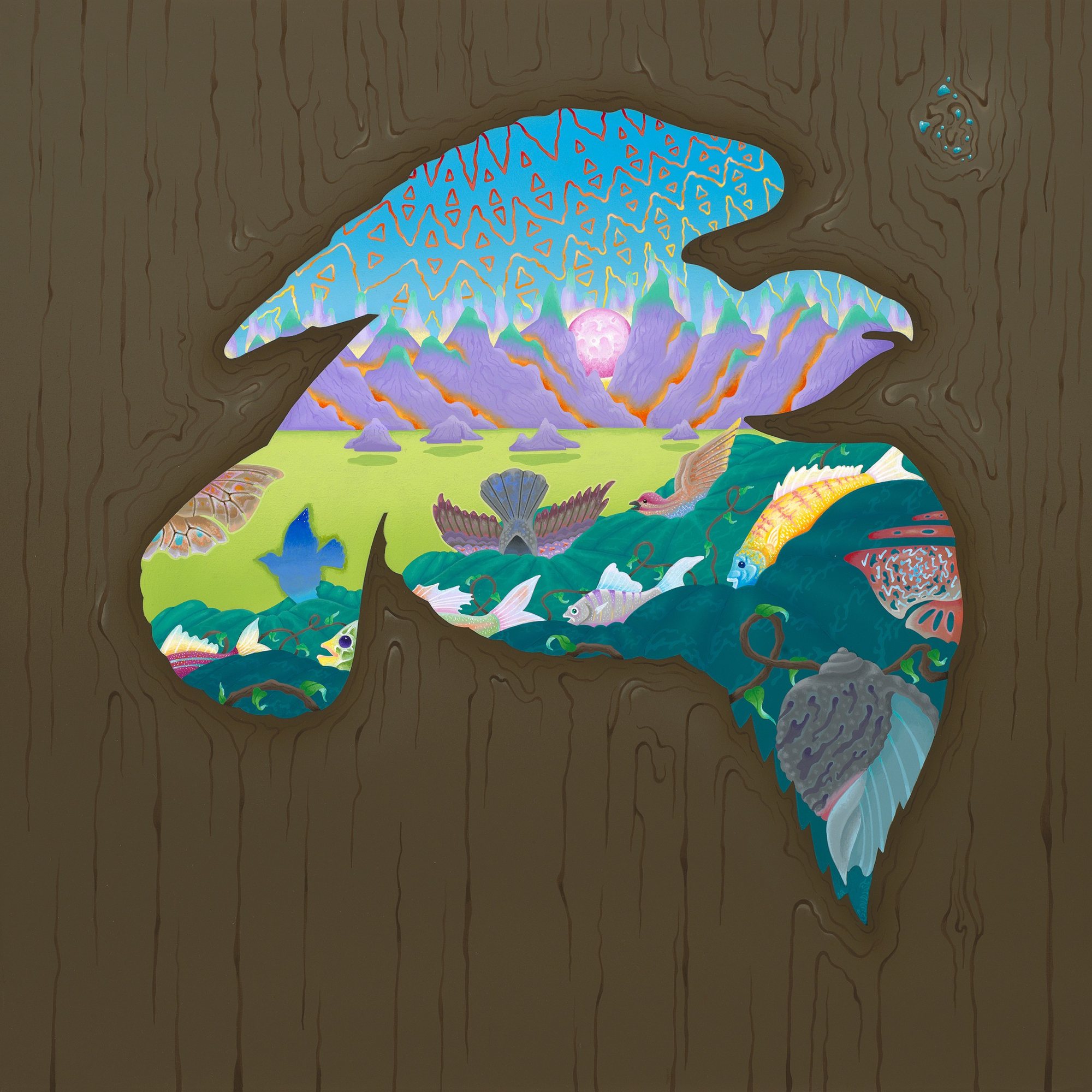 A layered, colorful bird form against a wood background.
