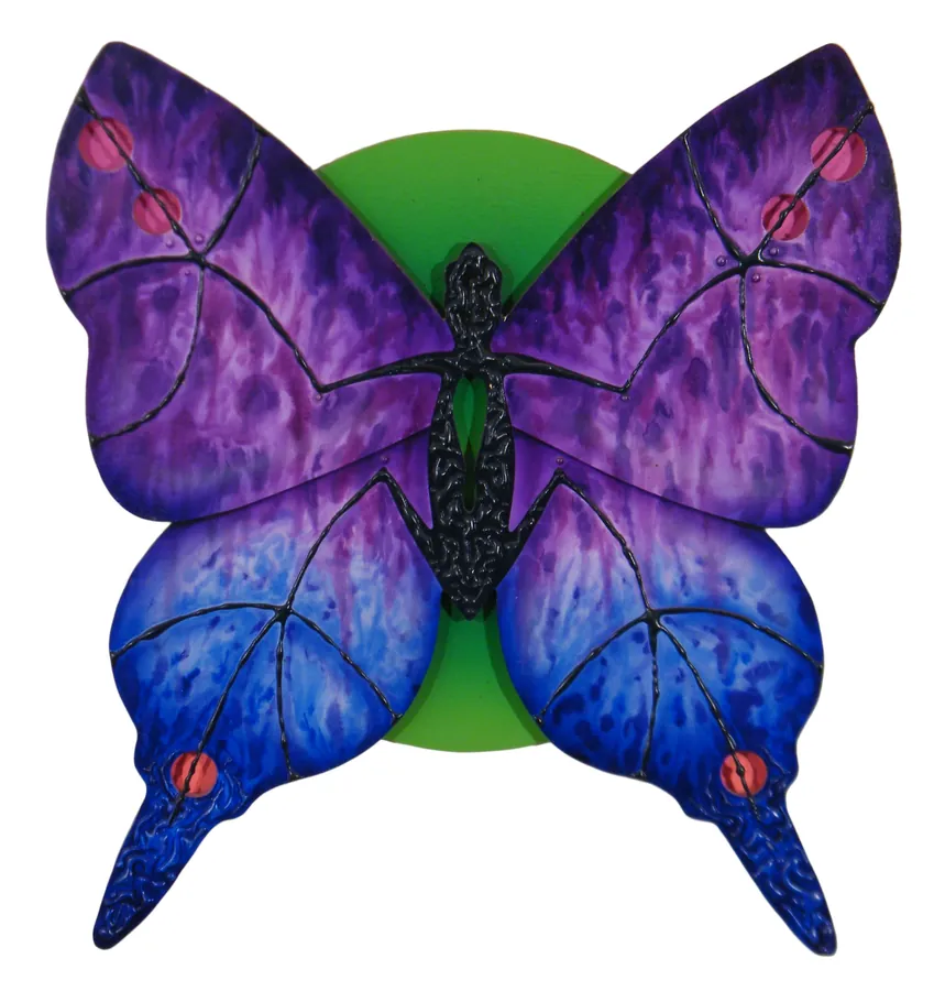A purple-and-blue butterfly spreads its wings over a green circle.