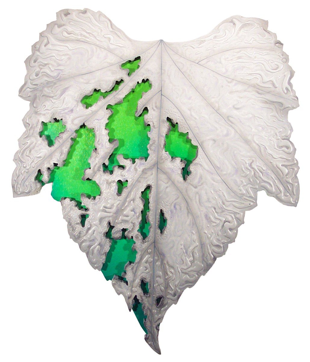 A white leaf carved in relief, with green showing through openings in its surface.