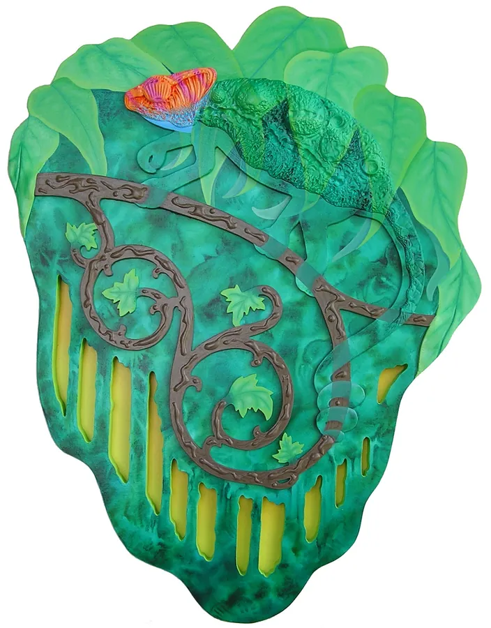 A green chameleon and a curling vine across a leaf-shaped green relief, with a red mushroom at the top.